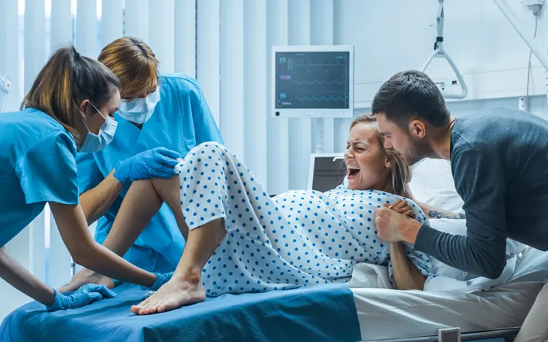 Become a Midwife Without a Nursing Degree- A 7 Step Complete Guide 4 Midwives Assisting During Labor